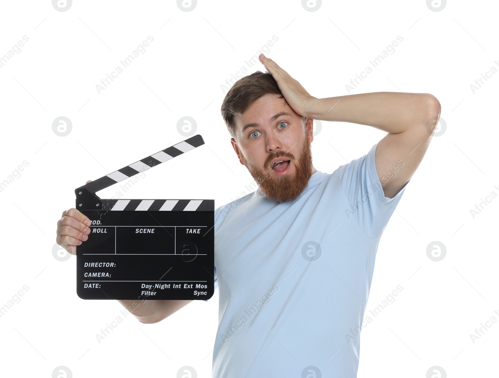 Photo of Making movie. Man with clapperboard on white background