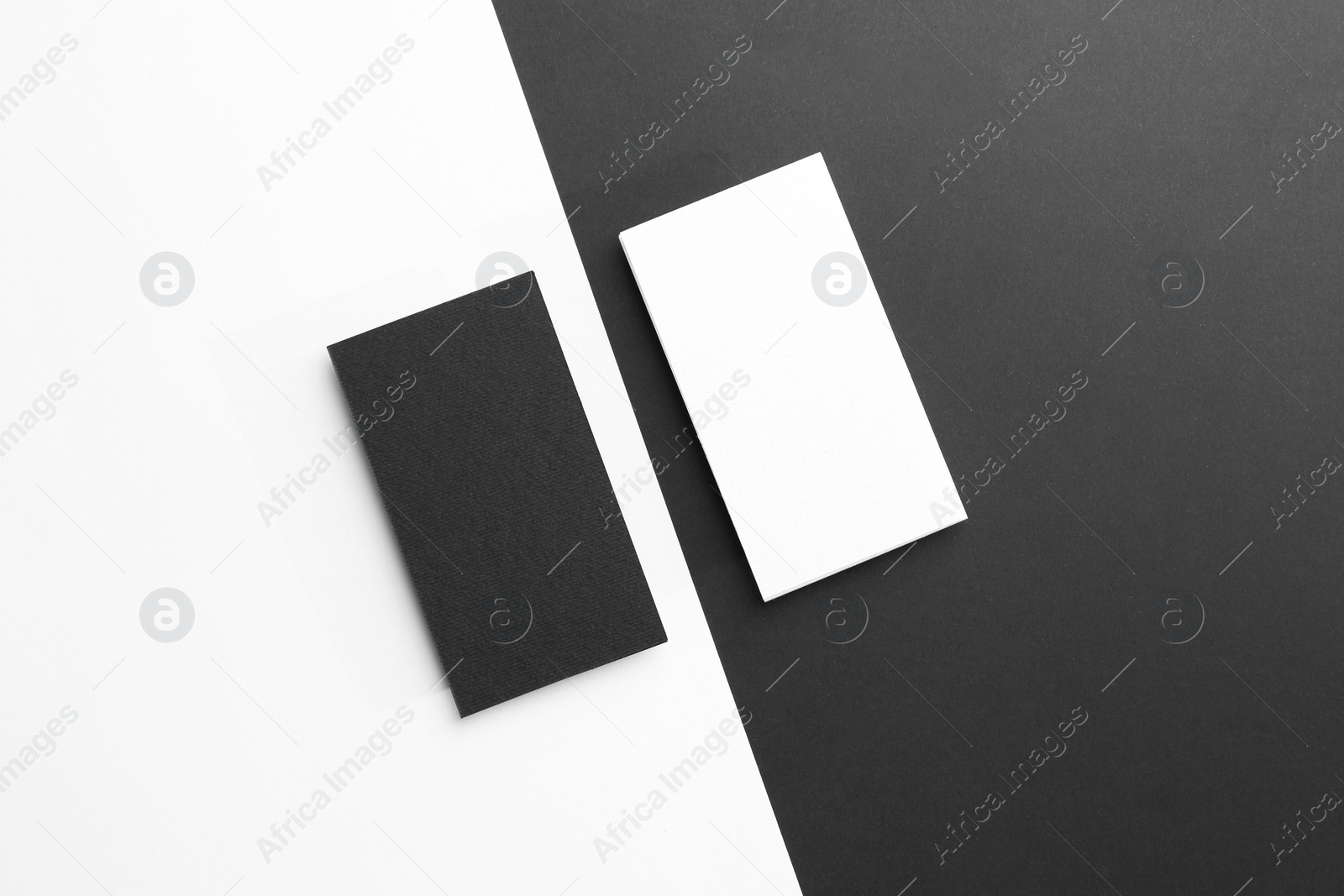 Photo of Blank business cards on color background, flat lay. Mockup for design