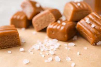 Salt and caramel on parchment, closeup view