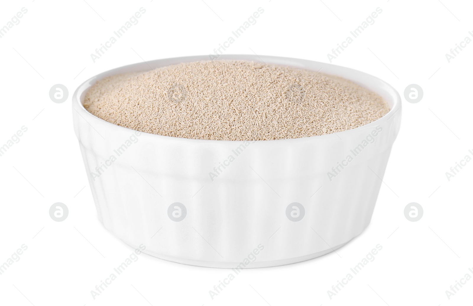 Photo of Bowl of active dry yeast isolated on white