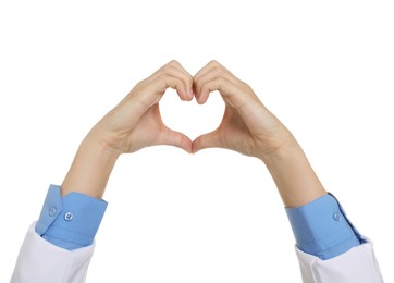 Doctor showing heart gesture with hands on white background, closeup