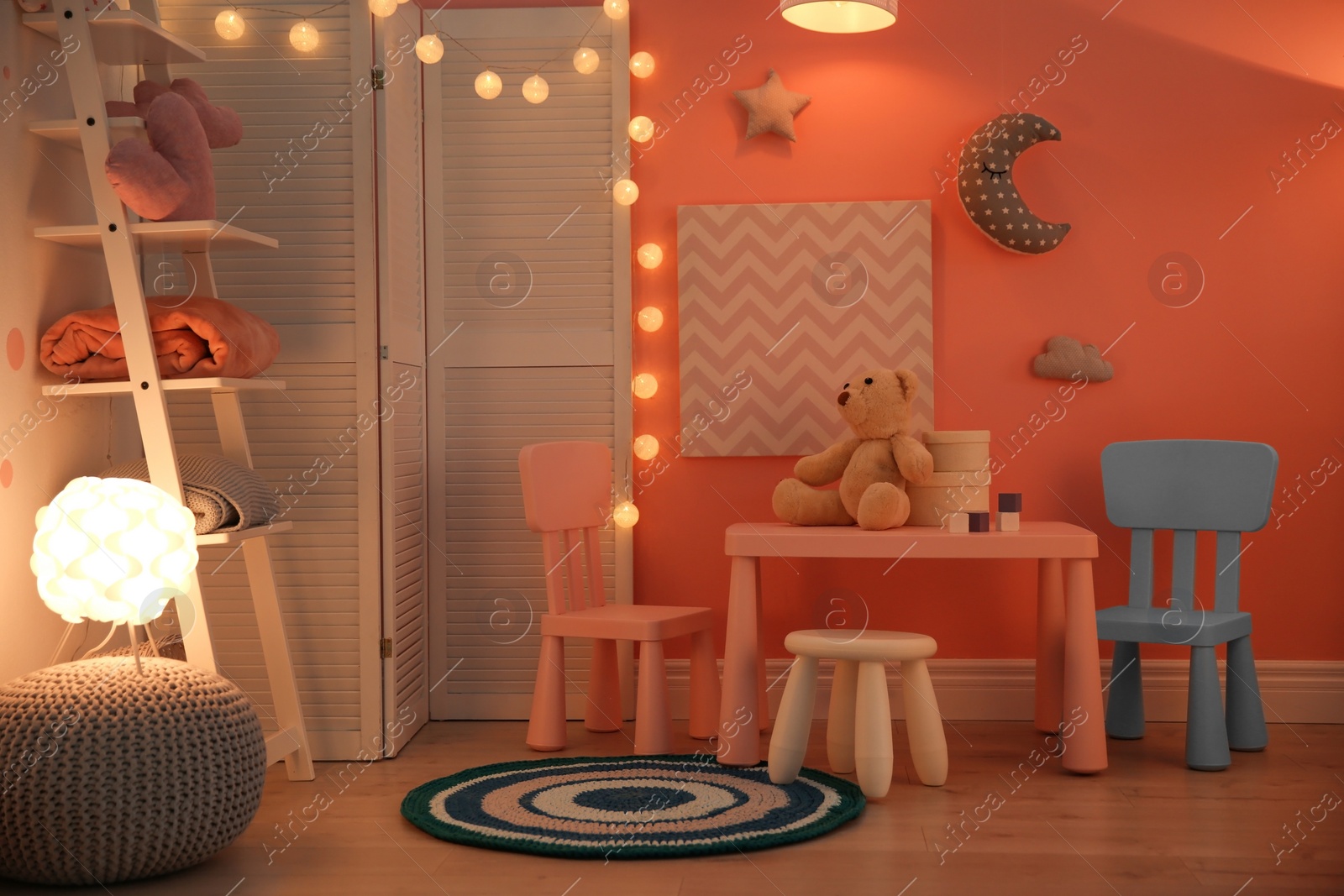 Photo of Modern child room interior with toys and decorations