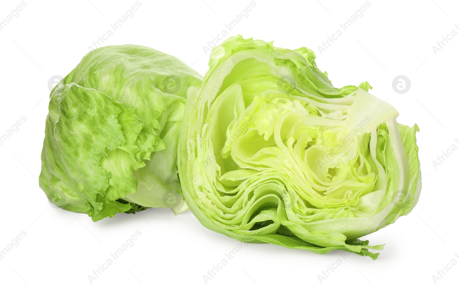 Photo of Whole and cut fresh green iceberg lettuces isolated on white