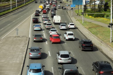 Lots of cars in traffic jam on city street