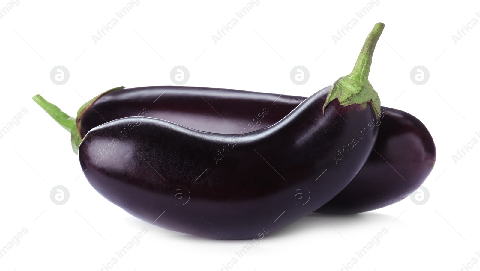 Photo of Tasty raw ripe eggplants isolated on white