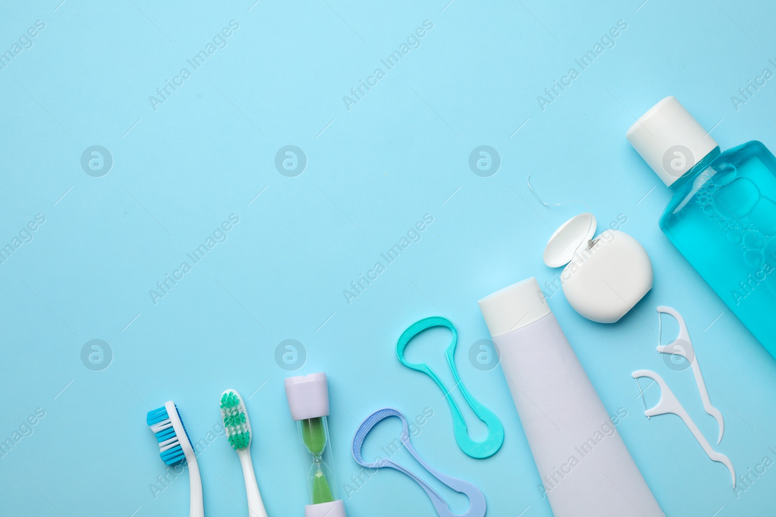 Photo of Flat lay composition with tongue cleaner on color background, space for text