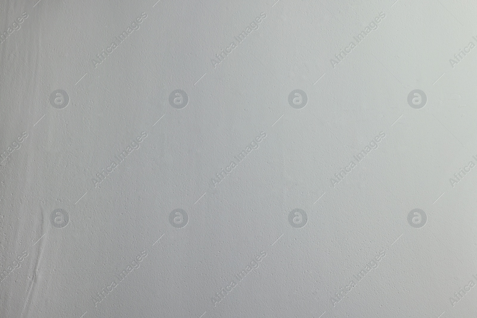 Photo of Wall covered with plaster as background, closeup