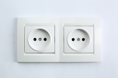 Photo of Power sockets on white background. Electrician's equipment