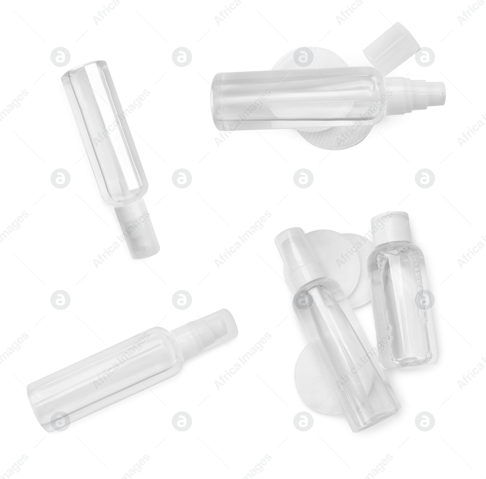 Image of Set with bottles of micellar cleansing water and cotton pads on white background, top view