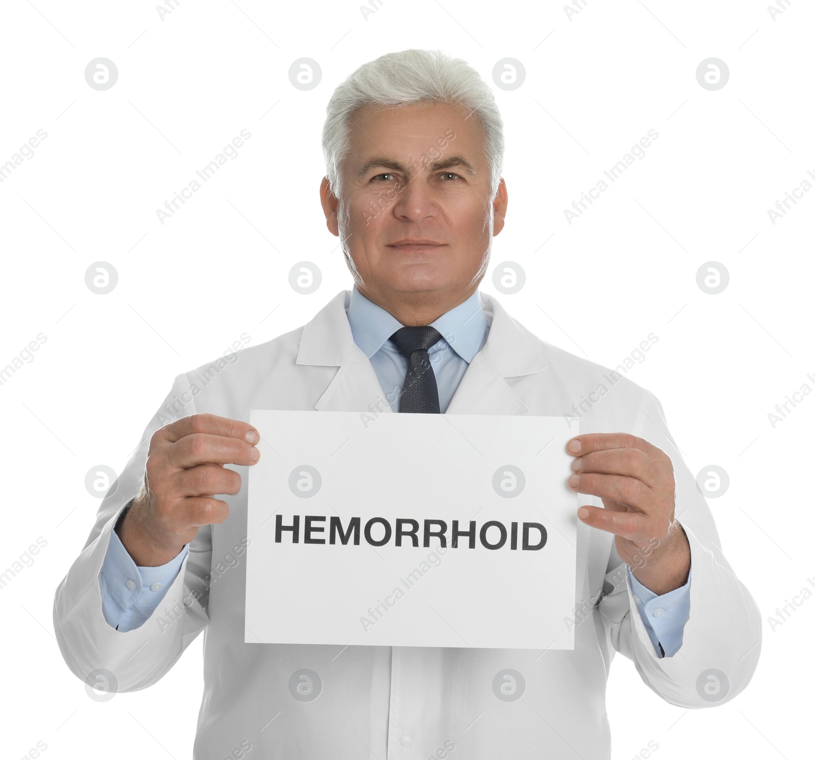 Photo of Doctor holding sign with word HEMORRHOID on white background