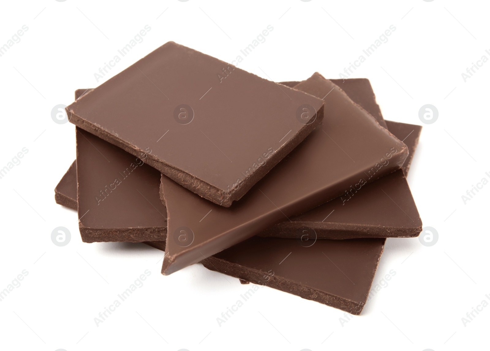 Photo of Pieces of tasty dark chocolate bar on isolated white