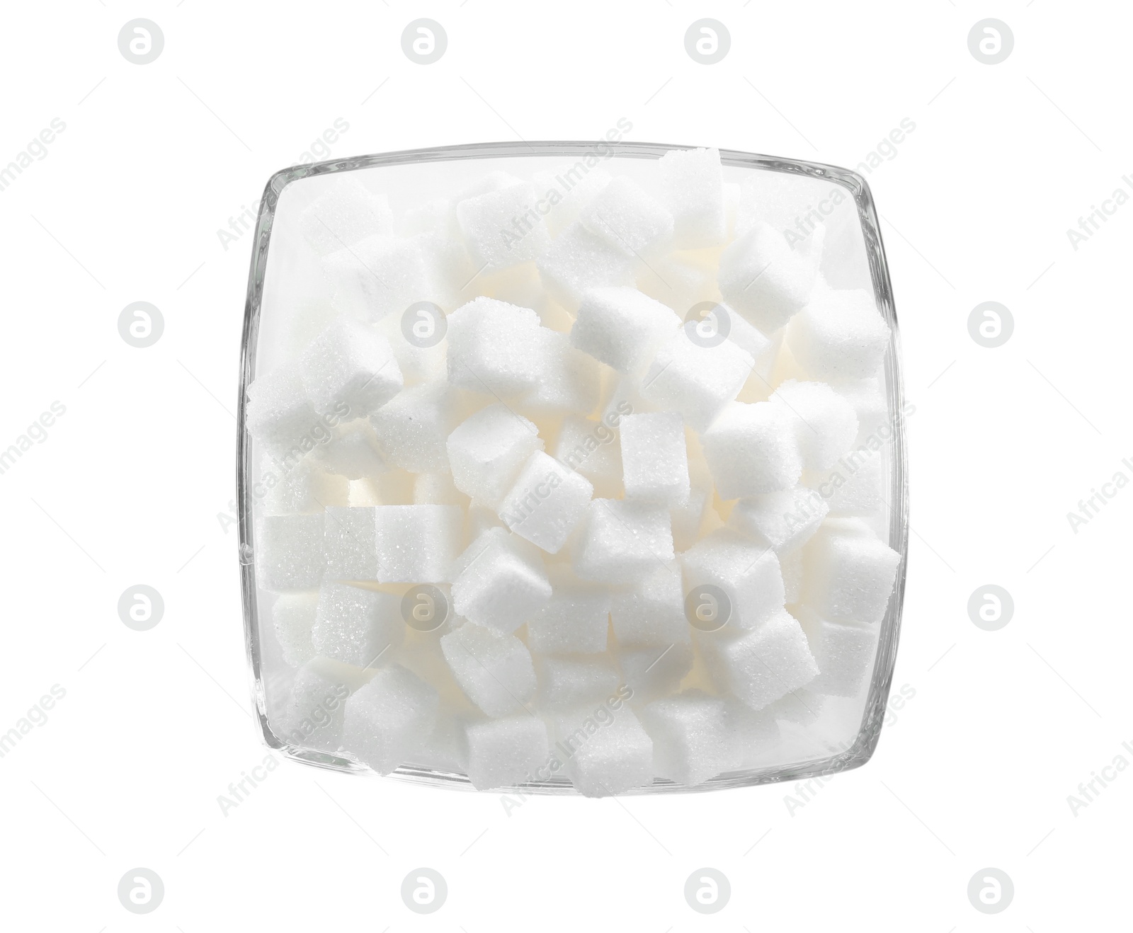 Photo of Refined sugar cubes in bowl on white background, top view