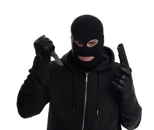 Man wearing black balaclava with knife and gun on white background