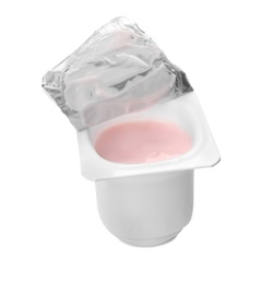 Photo of Plastic cup with yummy yogurt on white background