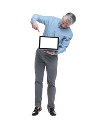 Photo of Mature businessman in stylish clothes with laptop on white background