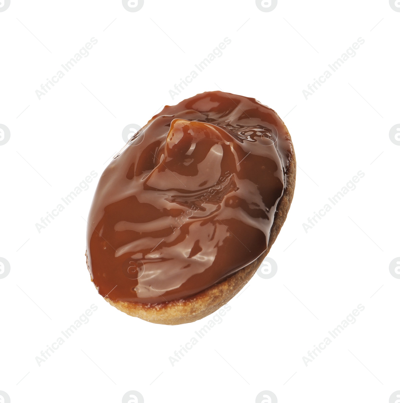 Photo of Half of delicious nut shaped cookie with boiled condensed milk isolated on white