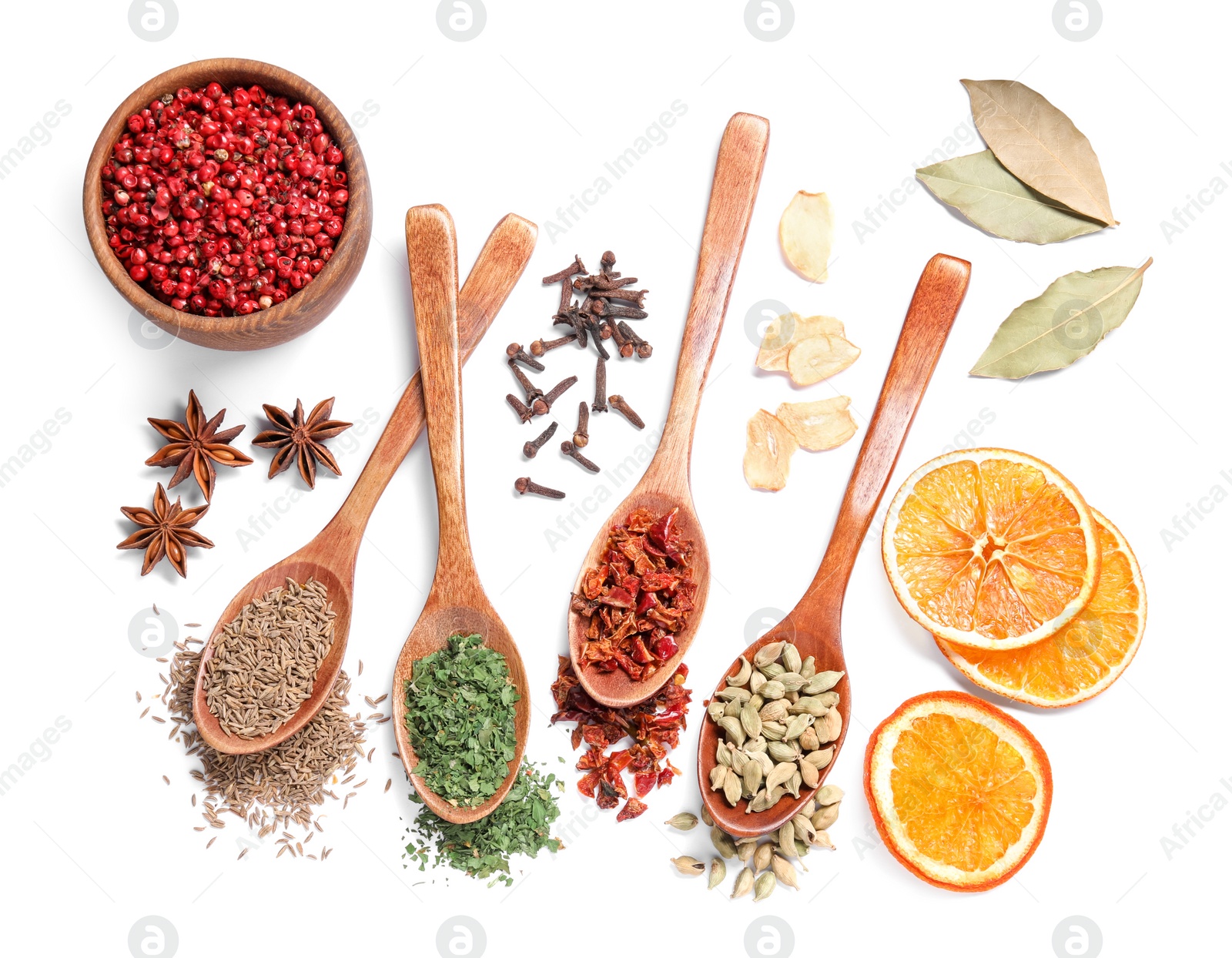 Photo of Wooden spoons with different spices on white background, top view