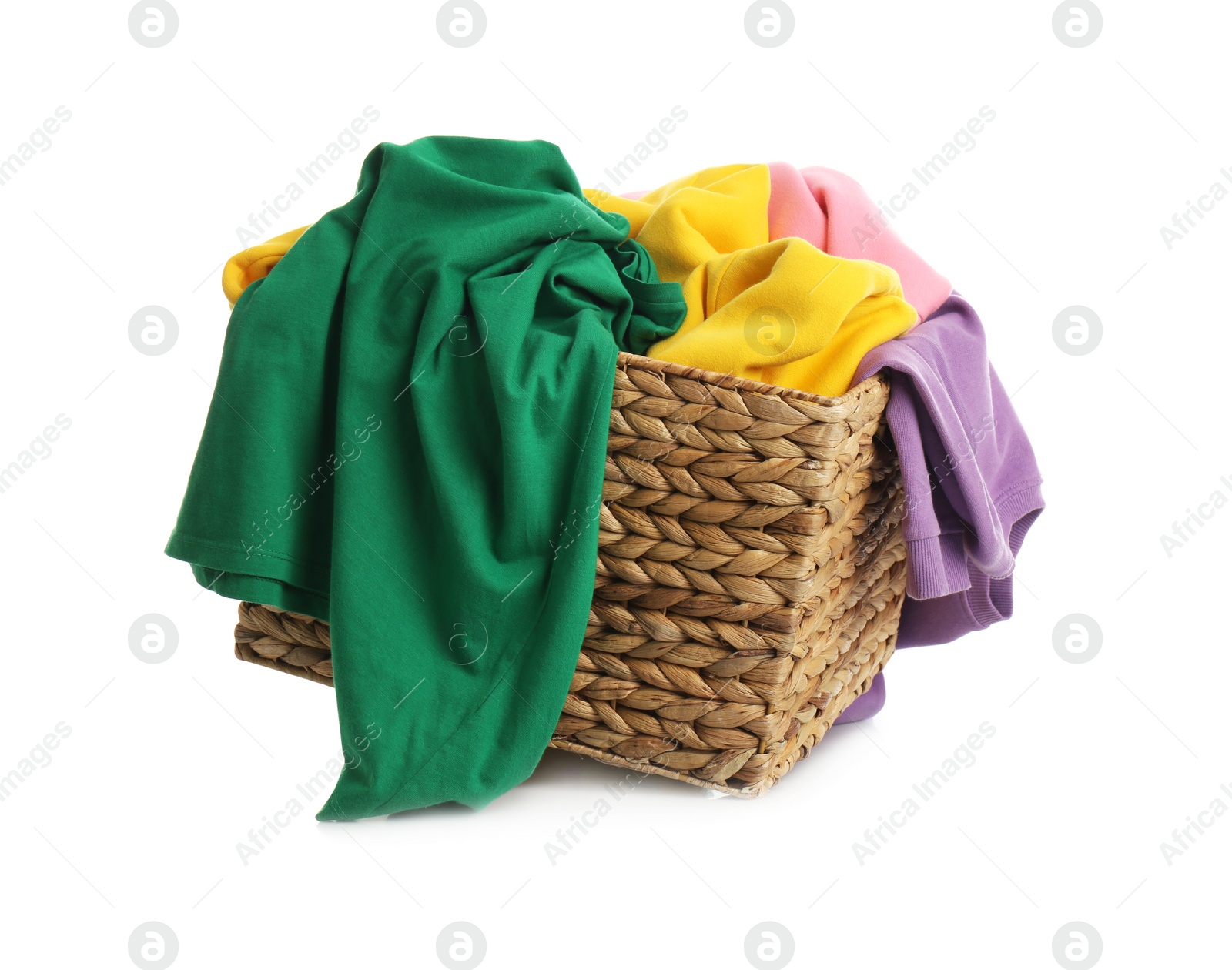 Photo of Wicker laundry basket with different clothes isolated on white