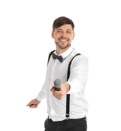 Handsome man in formal clothes with microphone on white background