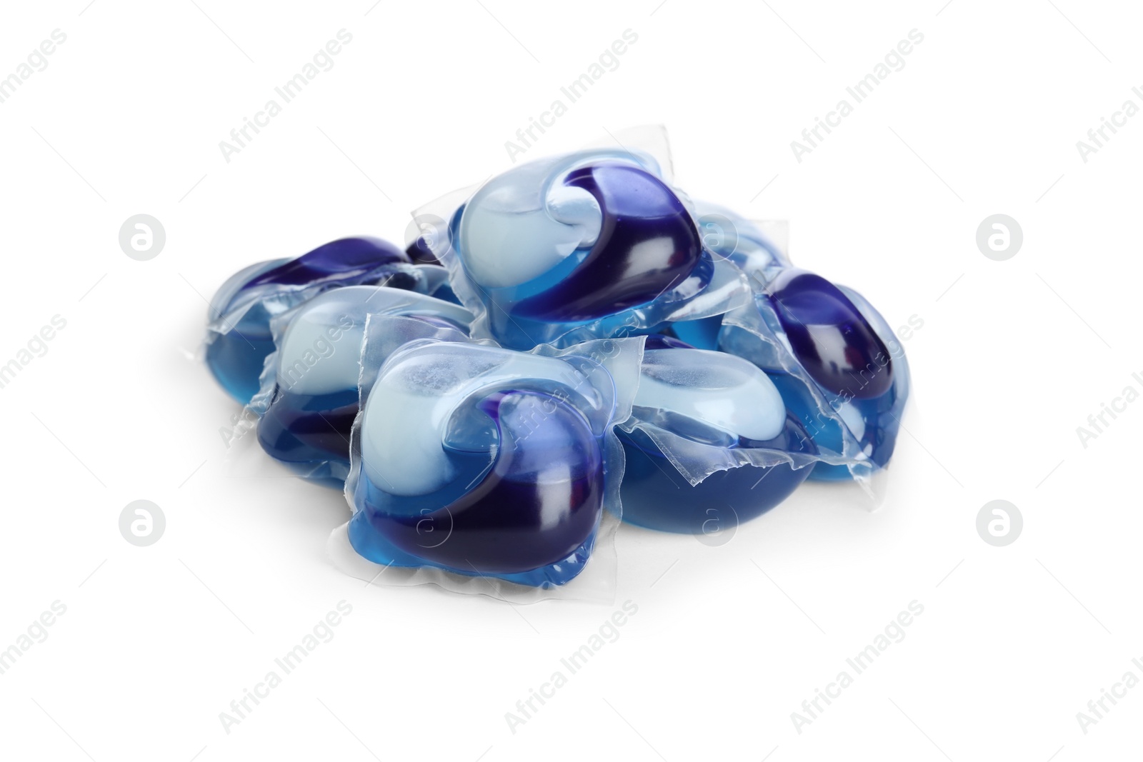 Photo of Heap of laundry capsules on white background