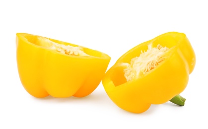 Halves of yellow bell pepper isolated on white