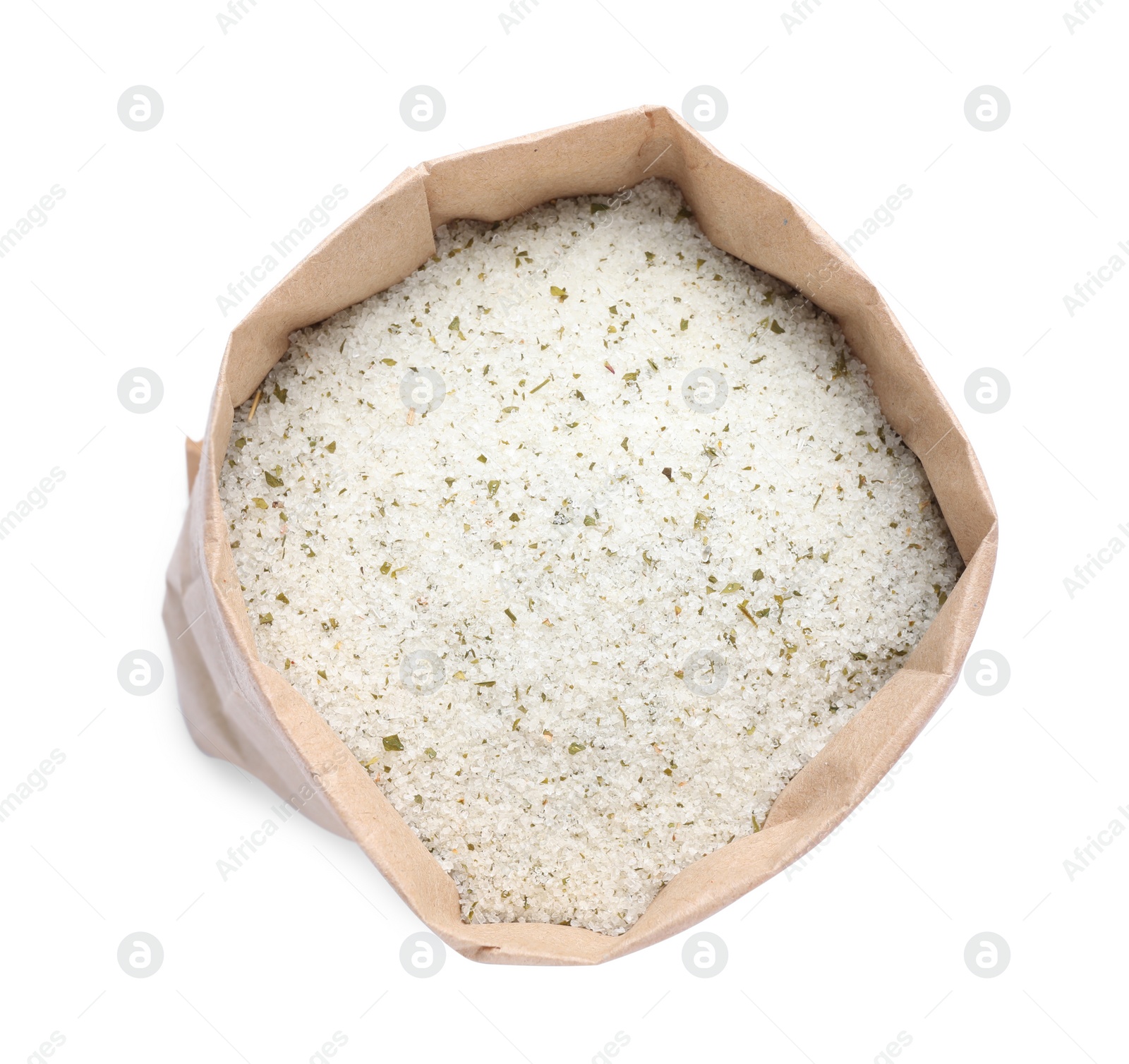 Photo of Natural herb salt in paper bag isolated on white, top view