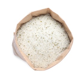Photo of Natural herb salt in paper bag isolated on white, top view