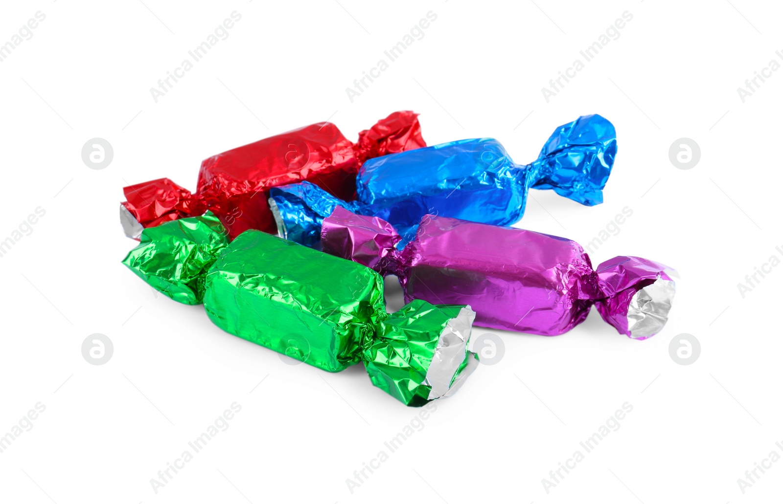 Photo of Tasty candies in colorful wrappers isolated on white