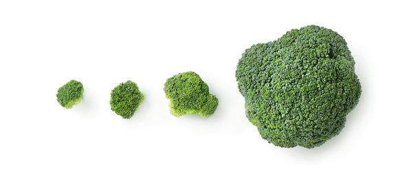 Photo of Flat lay composition with fresh green  broccoli on light background