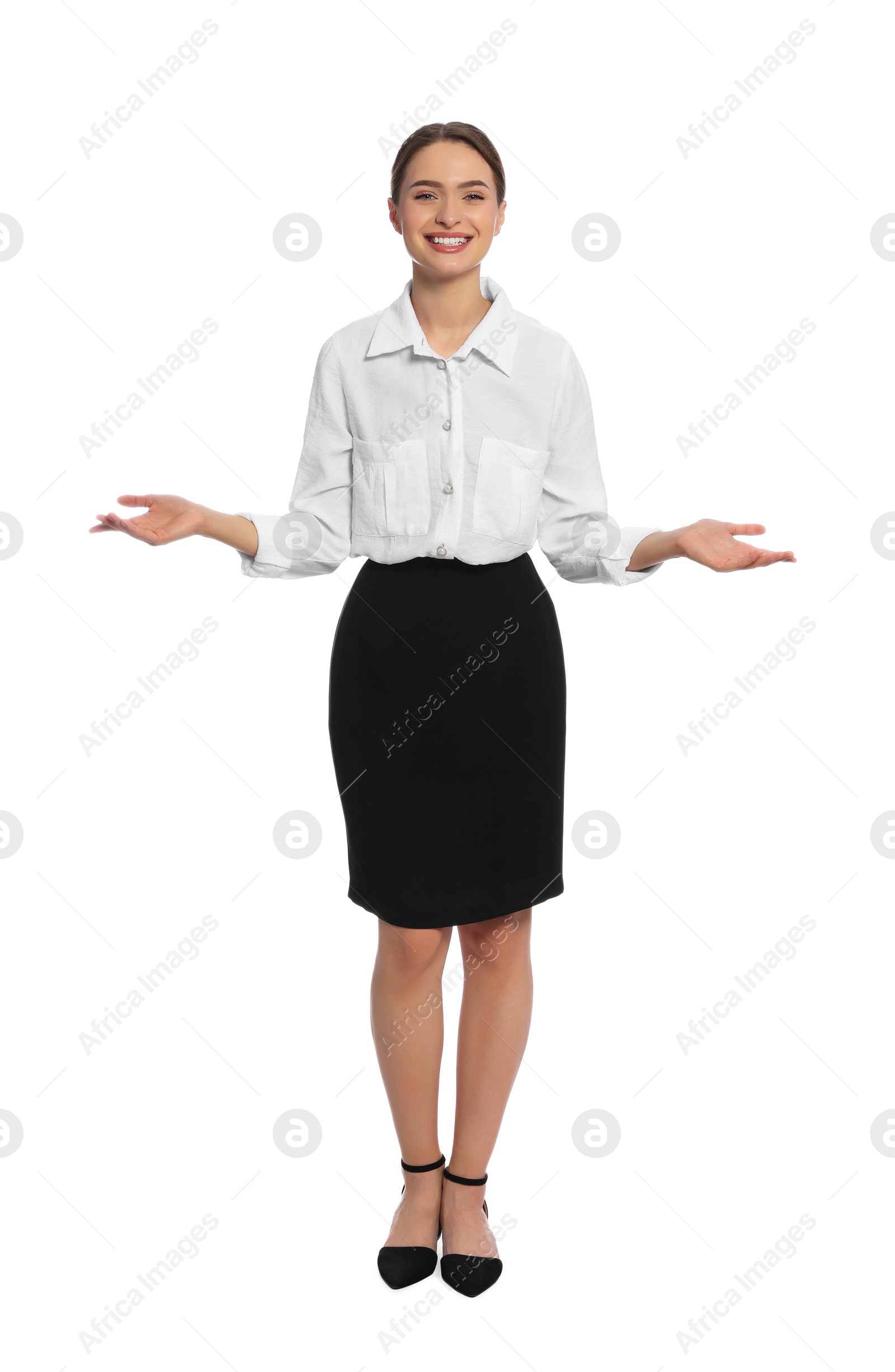 Photo of Full length portrait of hostess in uniform on white background