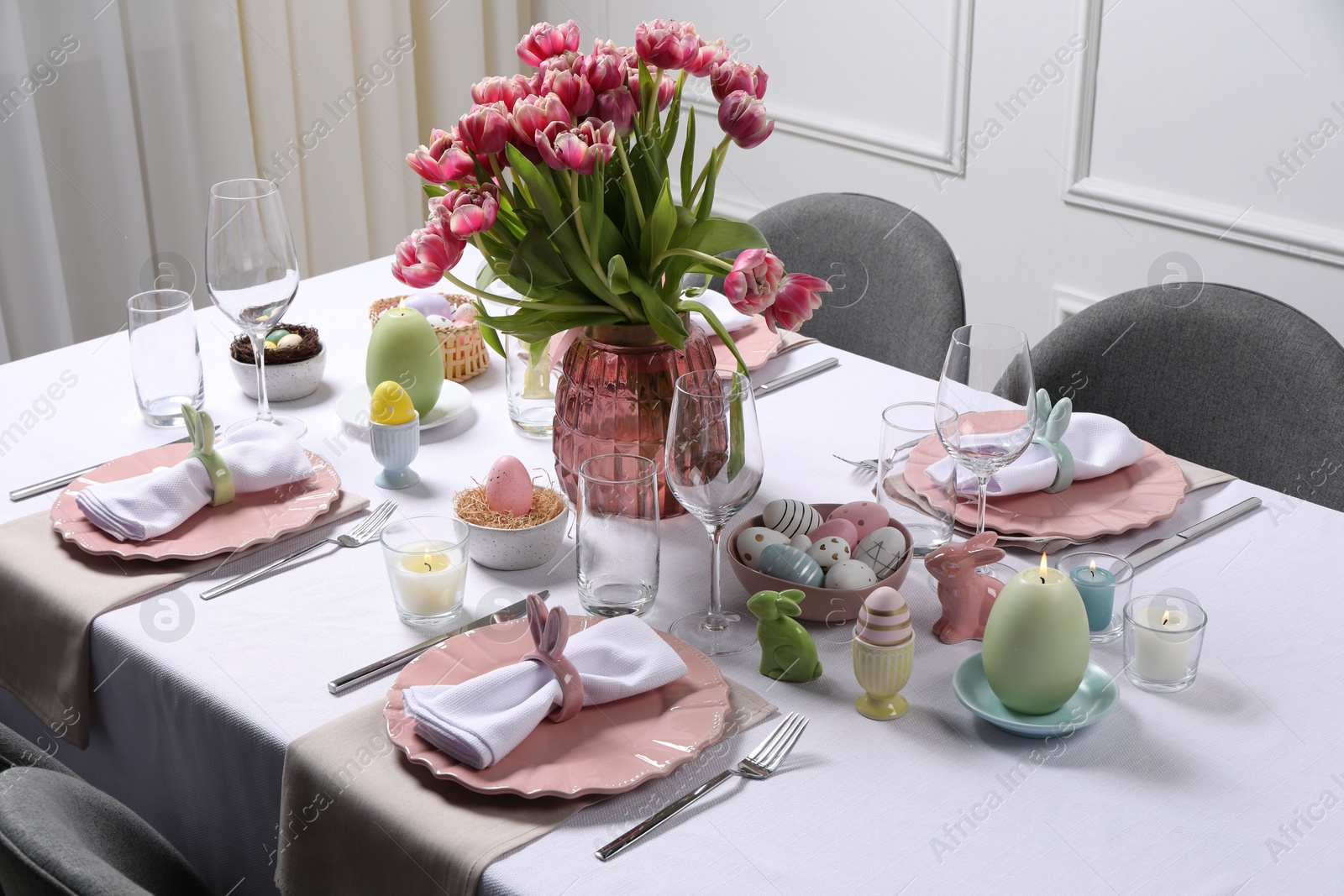 Photo of Festive table setting with beautiful flowers. Easter celebration