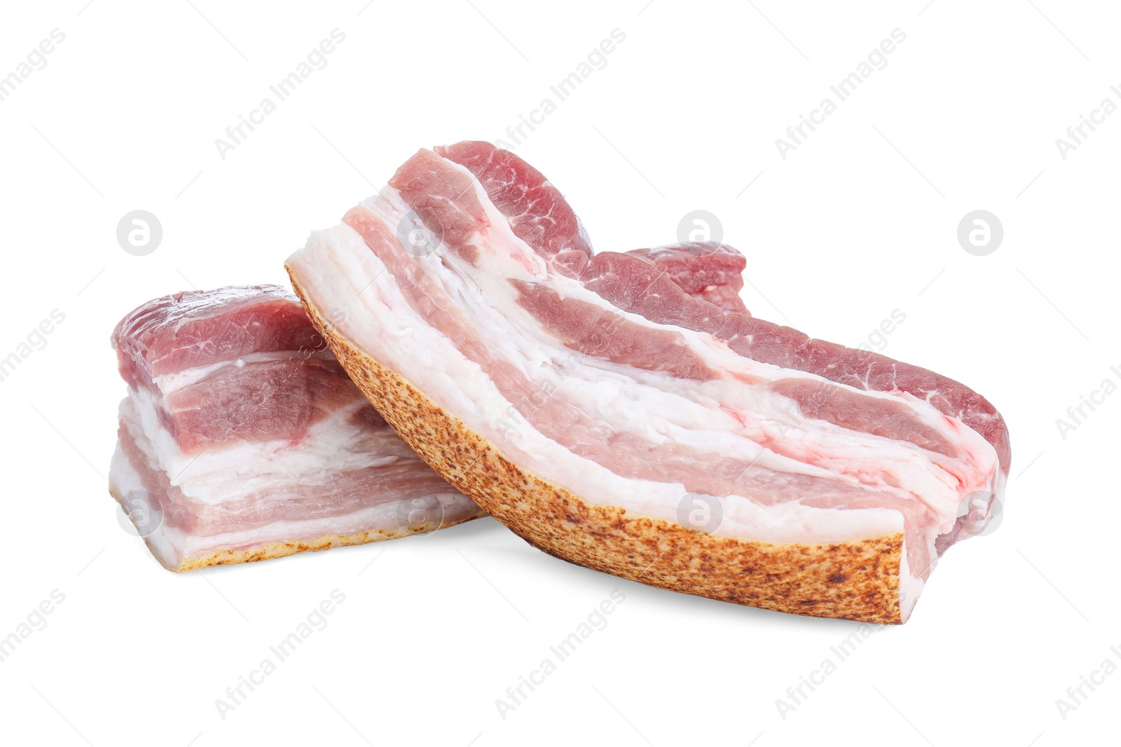 Photo of Pieces of raw pork belly isolated on white