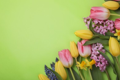Photo of Beautiful different flowers on green background, flat lay. Space for text