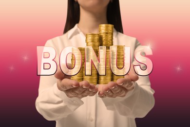 Image of Bonus. Woman holding many stacked coins on gradient background, closeup