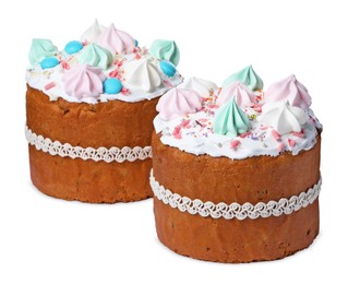 Photo of Traditional Easter cakes with meringues on white background