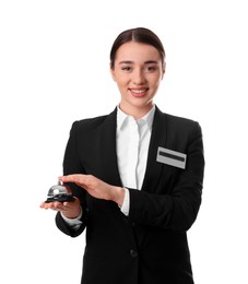 Photo of Happy young receptionist in uniform holding service bell on white background