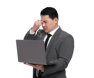 Photo of Tired businessman in suit with laptop on white background