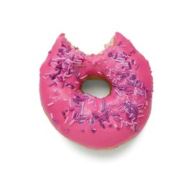 Photo of Tasty bitten glazed donut decorated with sprinkles isolated on white, top view