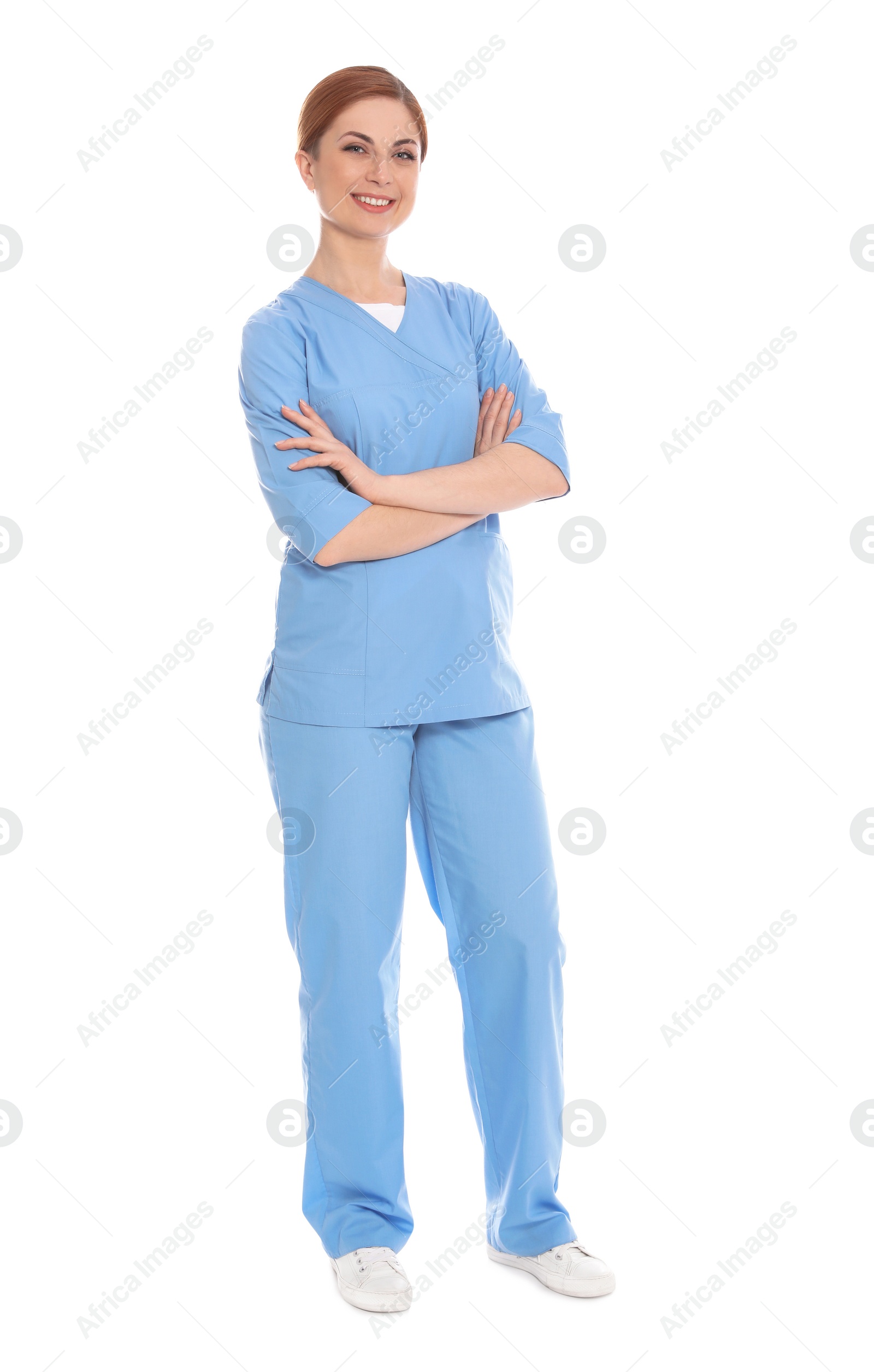 Photo of Full length portrait of medical doctor isolated on white