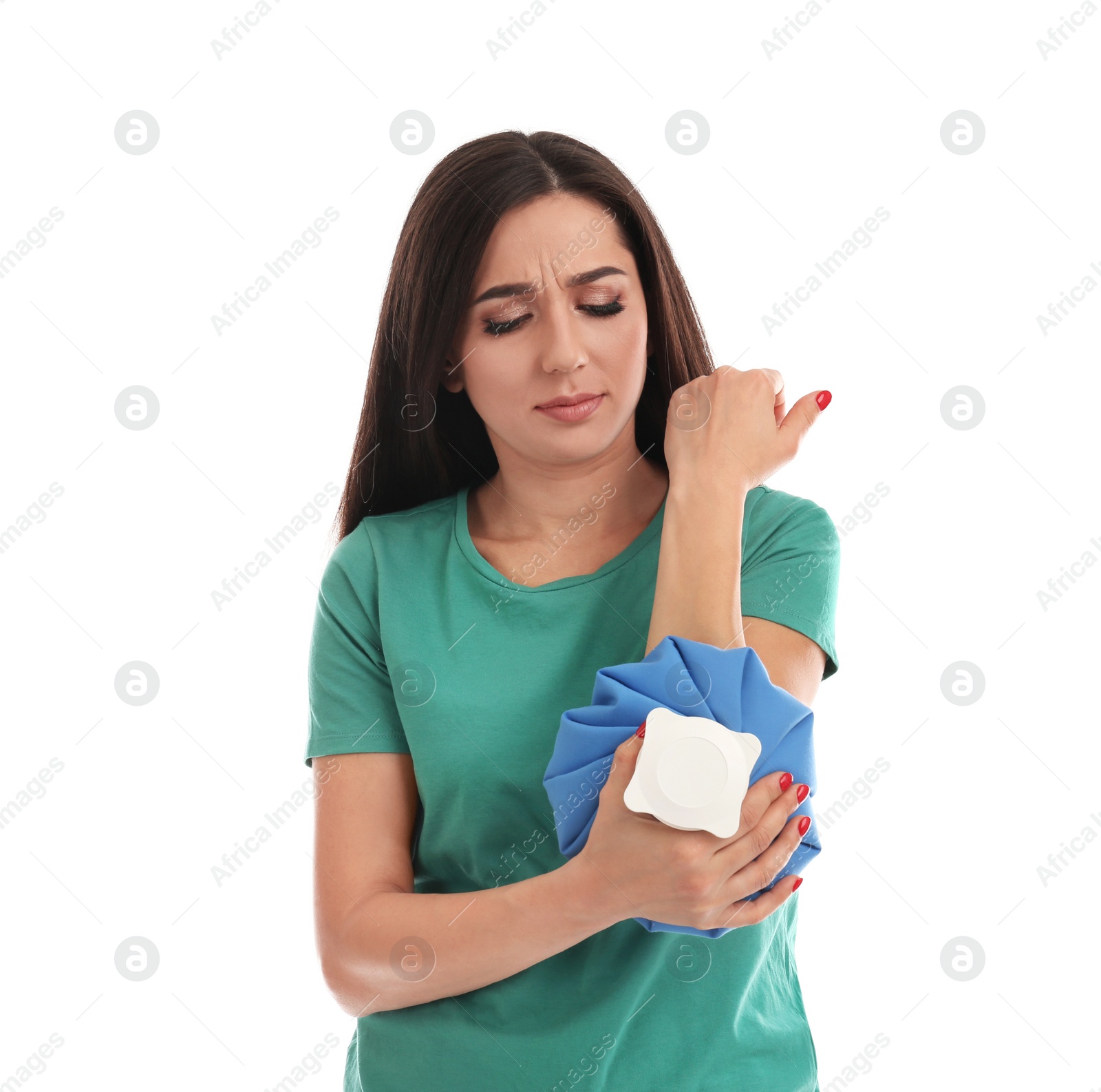 Photo of Woman with cold compress suffering from elbow pain on white background