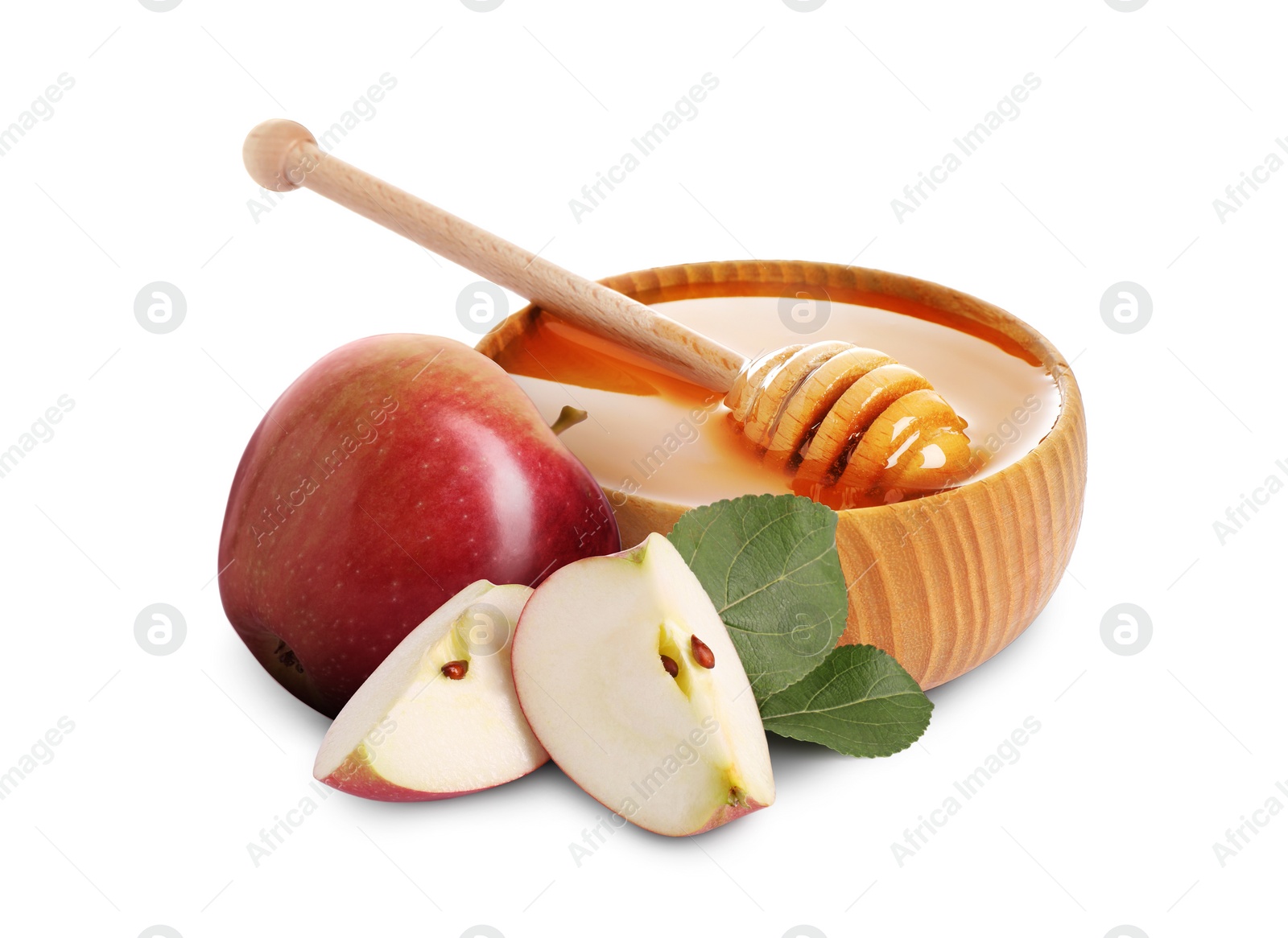 Image of Honey in bowl and apples isolated on white