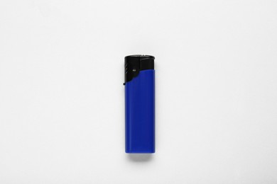 Photo of Stylish small pocket lighter on white background, top view