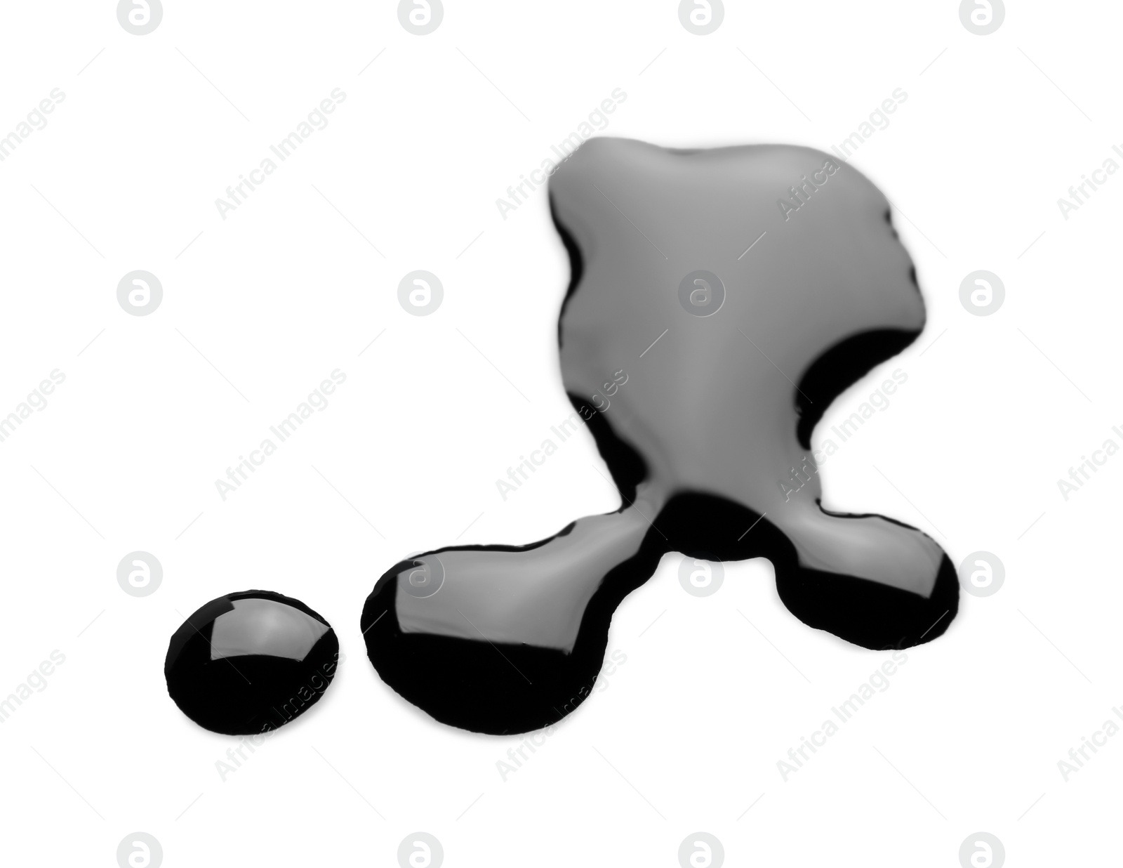 Photo of Blobs of black oil isolated on white