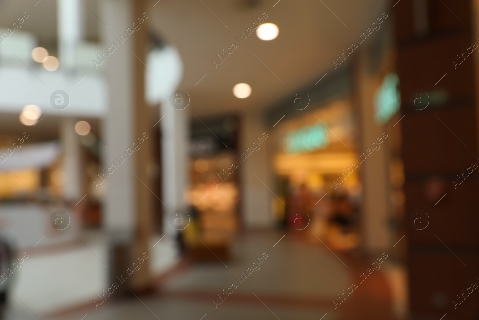 Photo of Blurred view of shopping mall interior. Bokeh effect