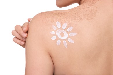 Photo of Beautiful young woman with sun protection cream on her back against white background, closeup