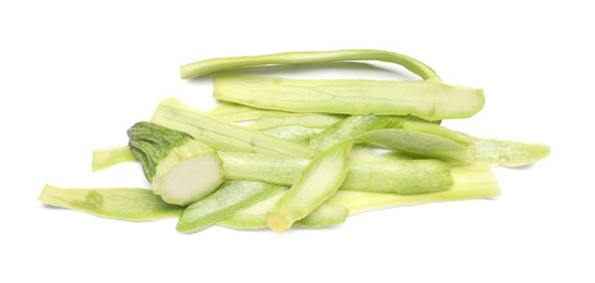Photo of Peels of fresh zucchini isolated on white