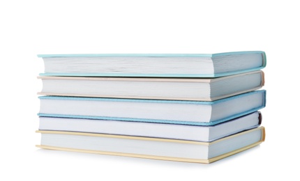 Photo of Stack of hardcover books on white background