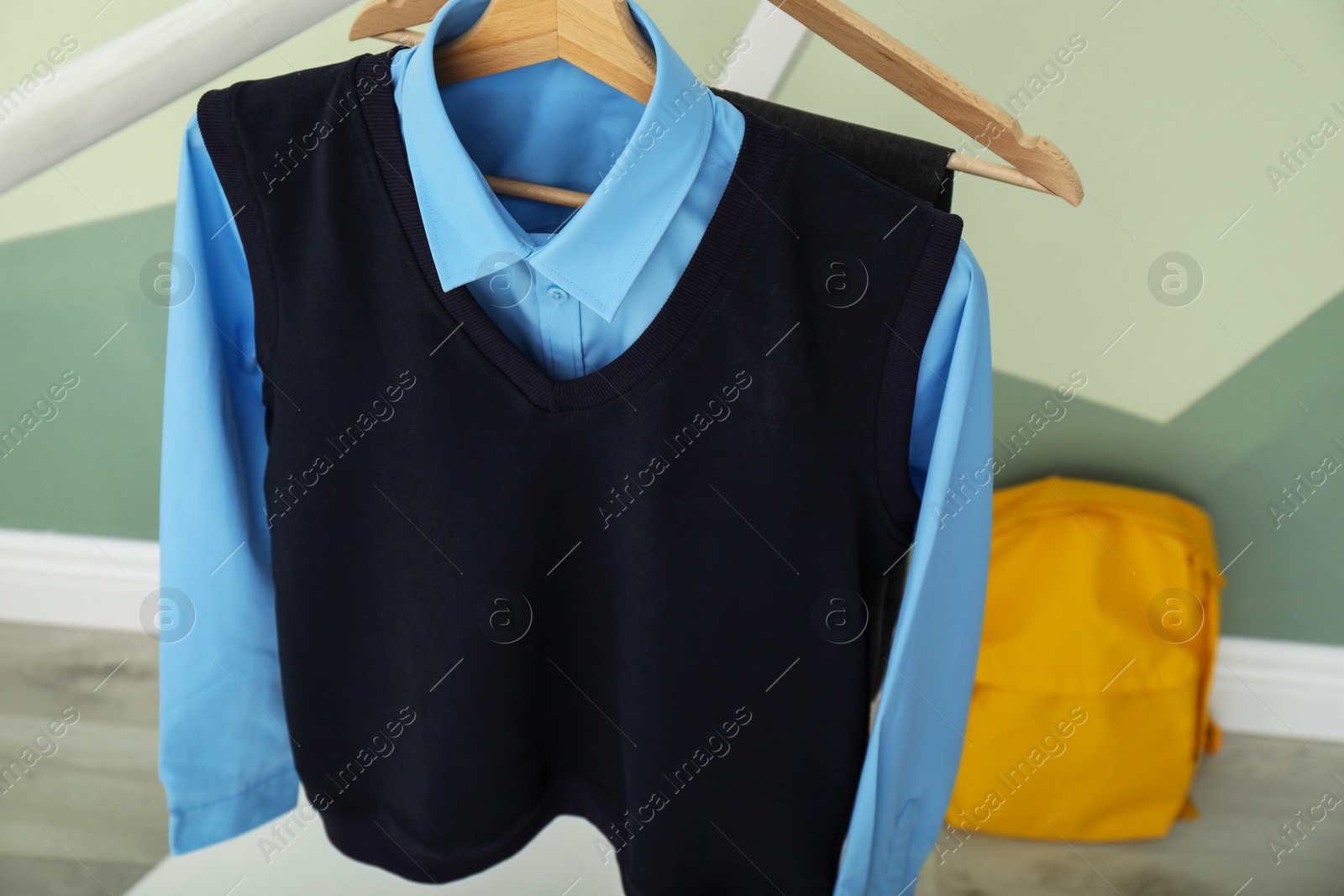 Photo of School uniform for boy on hanger, closeup