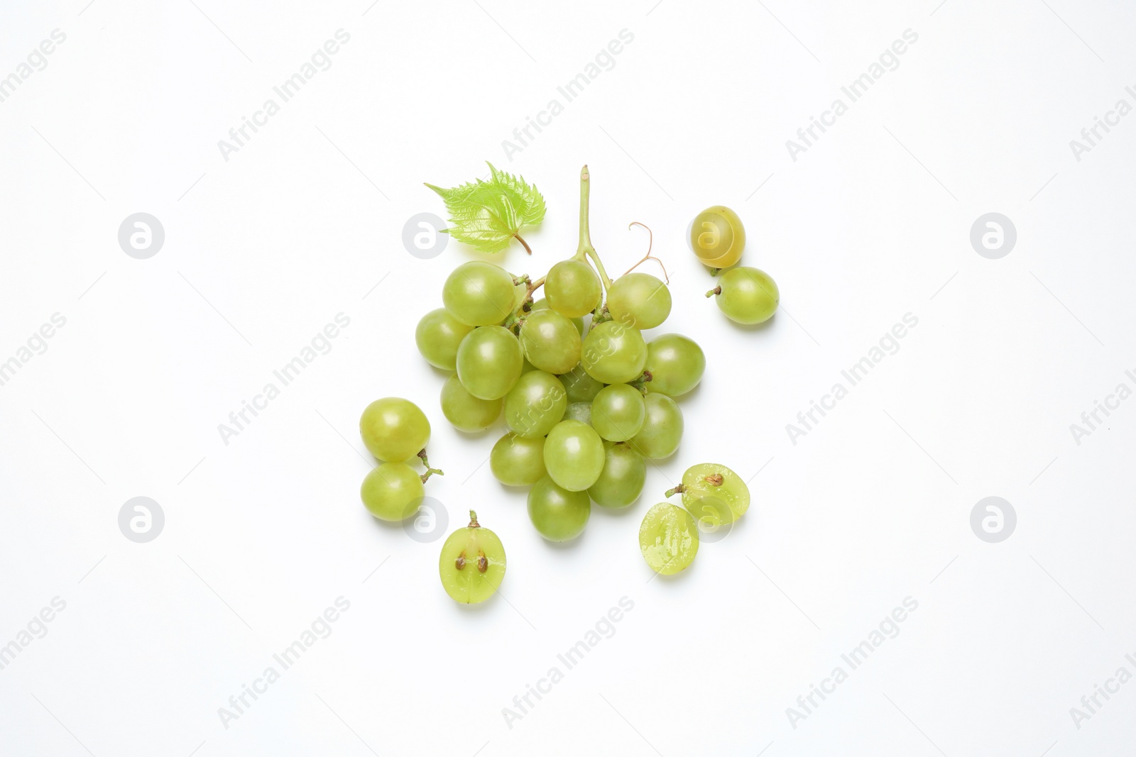 Photo of Bunch of fresh ripe green grapes with leaf on white background, top view