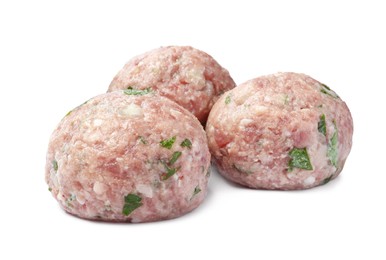 Photo of Three fresh raw meatballs on white background